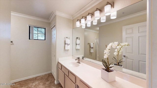 bathroom featuring crown molding and vanity