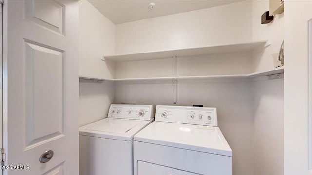 laundry room featuring independent washer and dryer