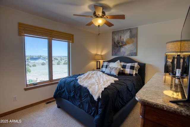 1420 S Haystack Rd, Taylor, AZ 85939 - carpeted bedroom featuring baseboards and a ceiling fan