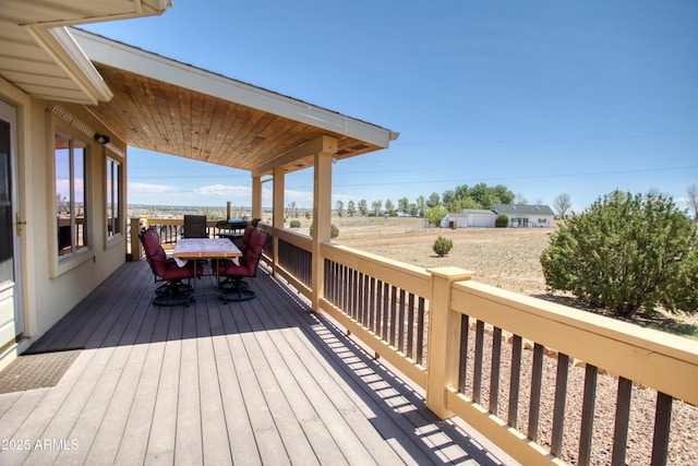 1420 S Haystack Rd, Taylor, AZ 85939 - wooden terrace with outdoor dining space