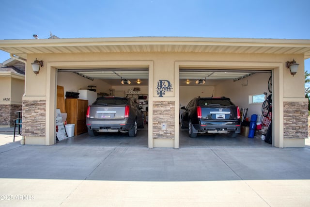 1420 S Haystack Rd, Taylor, AZ 85939 - garage featuring concrete driveway and a garage door opener