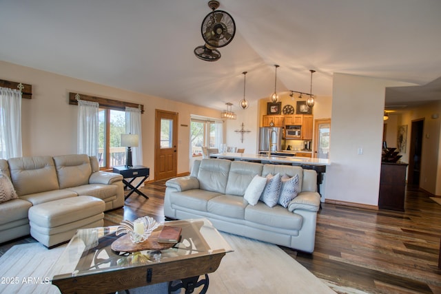 1420 S Haystack Rd, Taylor, AZ 85939 - living area featuring lofted ceiling, dark wood-style floors, and a ceiling fan