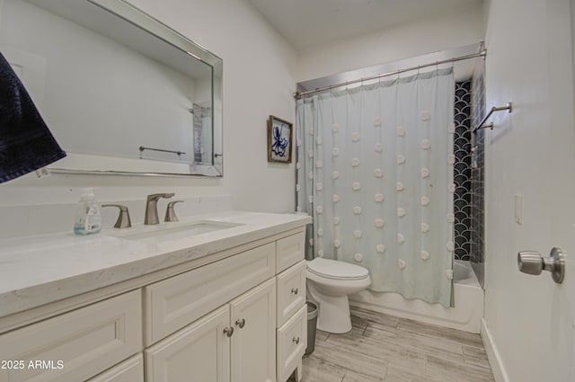 full bathroom featuring wood tiled floor, vanity, toilet, and shower / bath combo with shower curtain