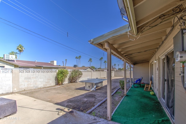 view of patio / terrace with a fenced backyard and central AC