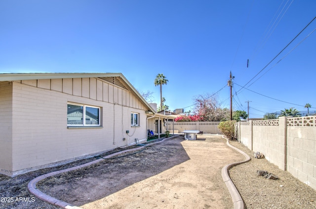 view of yard with a patio area and a fenced backyard