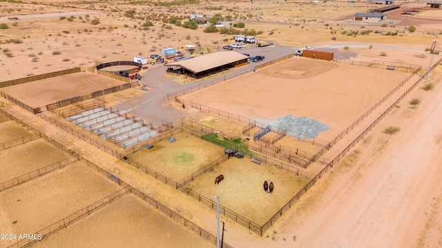 birds eye view of property featuring a rural view