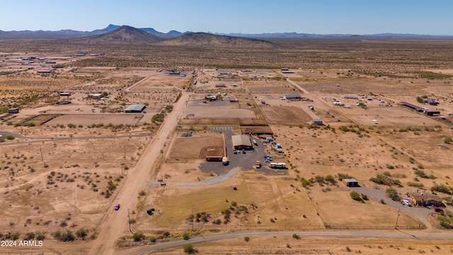 bird's eye view featuring a mountain view and a rural view