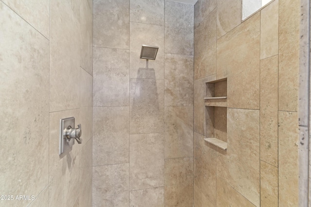 details featuring tiled shower