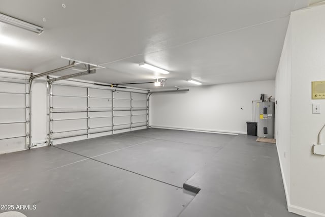 garage featuring a garage door opener and water heater