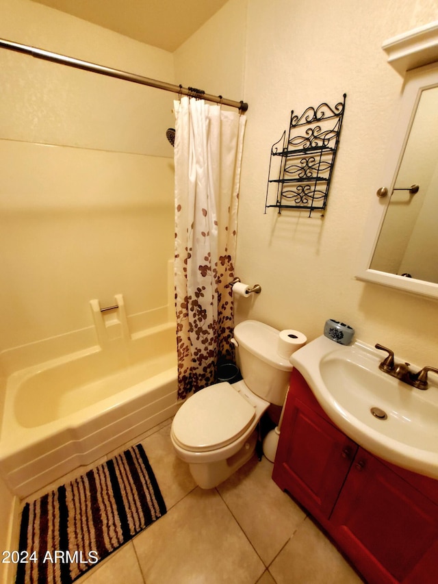 full bathroom with shower / tub combo, tile patterned flooring, toilet, and vanity