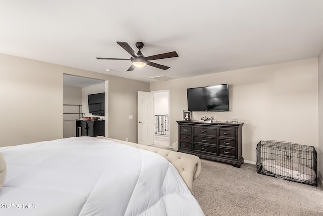 bedroom with a ceiling fan, carpet, and baseboards