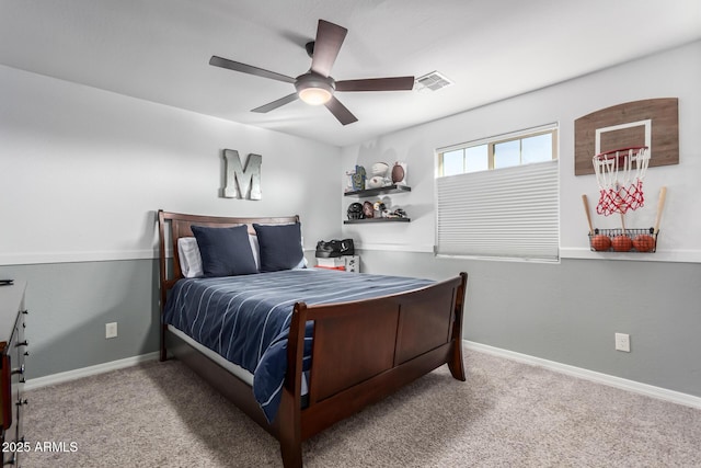 bedroom featuring a ceiling fan, baseboards, visible vents, and carpet flooring