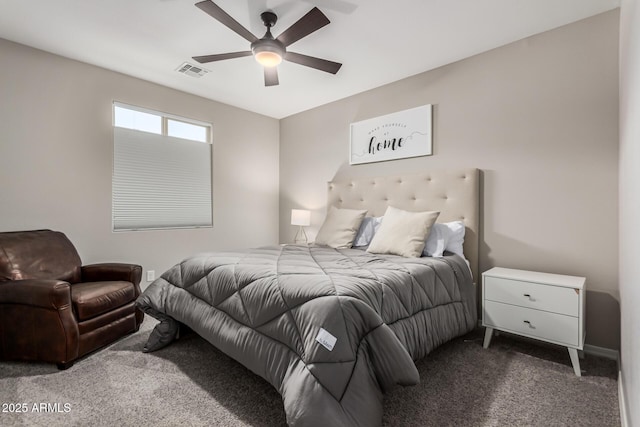 bedroom with carpet floors, visible vents, and a ceiling fan