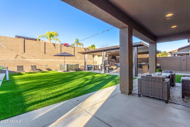 view of patio / terrace featuring a fenced backyard and an outdoor living space