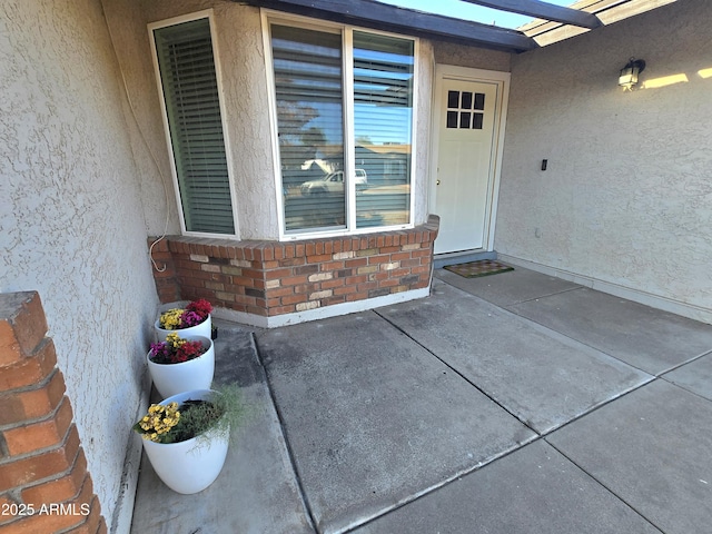 3722 E Glade Ave, Mesa, AZ 85206 - entrance to property with stucco siding and a patio