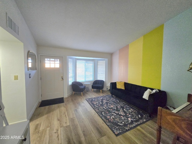 3722 E Glade Ave, Mesa, AZ 85206 - living area with light wood-style floors and baseboards