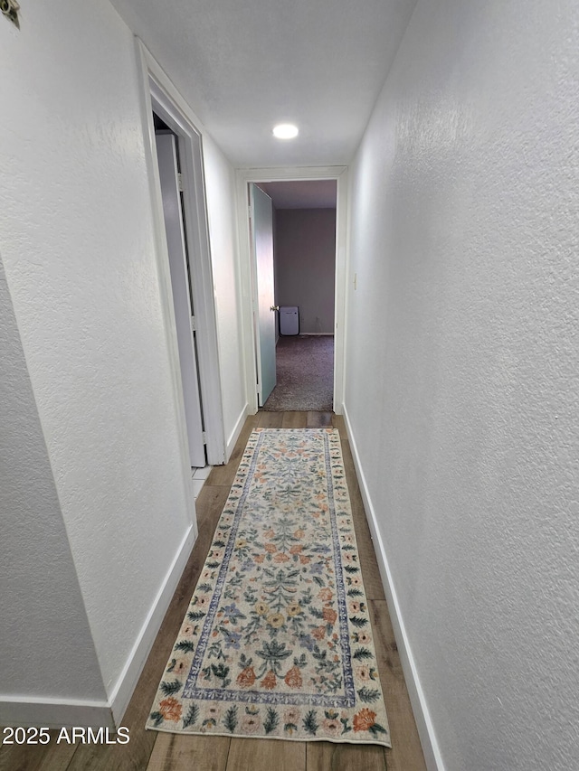 3722 E Glade Ave, Mesa, AZ 85206 - hallway featuring baseboards, wood finished floors, and a textured wall