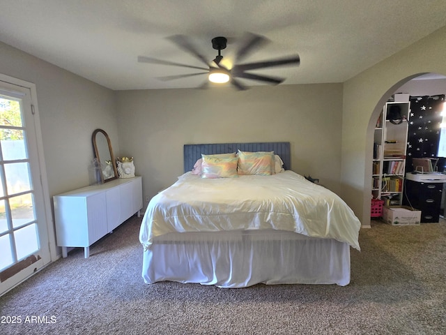 3722 E Glade Ave, Mesa, AZ 85206 - bedroom with carpet floors, arched walkways, and a ceiling fan