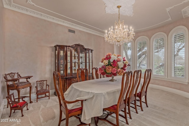 dining space featuring a notable chandelier, light carpet, visible vents, baseboards, and crown molding