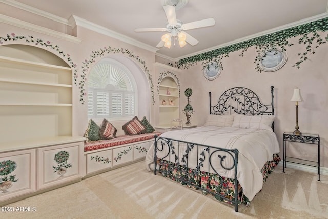 bedroom with carpet flooring, crown molding, and ceiling fan