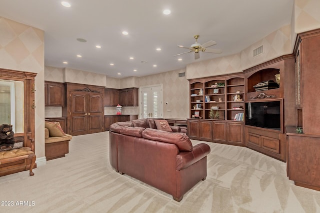 living area featuring visible vents, recessed lighting, light colored carpet, and wallpapered walls