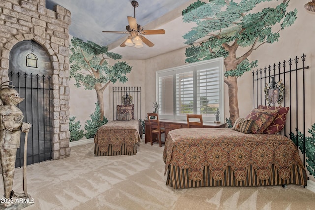 bedroom featuring ceiling fan, carpet floors, and baseboards