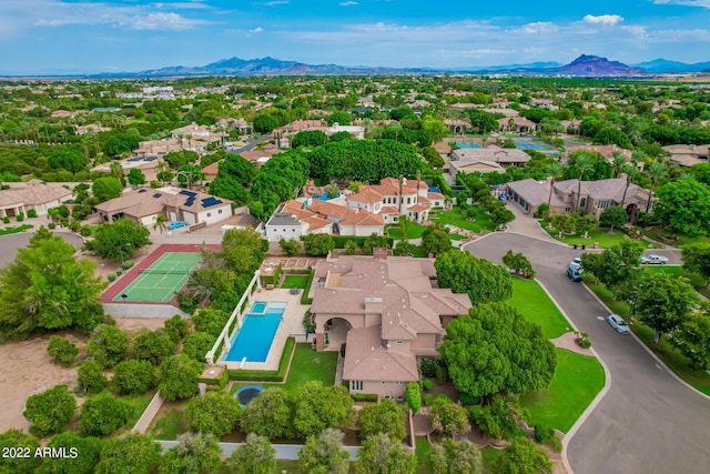 drone / aerial view with a residential view and a mountain view