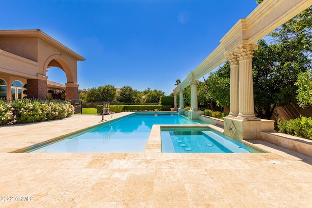 view of swimming pool featuring fence, a fenced in pool, and a patio