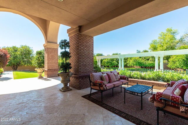 view of patio / terrace with outdoor lounge area and fence