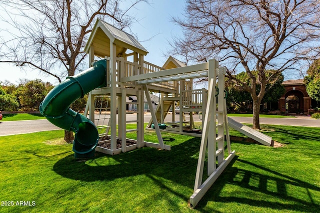 communal playground featuring a yard