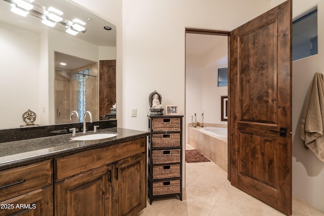 9216 E Sky Line Dr, Scottsdale, AZ 85262 - bathroom with a shower stall, tile patterned flooring, a garden tub, and vanity