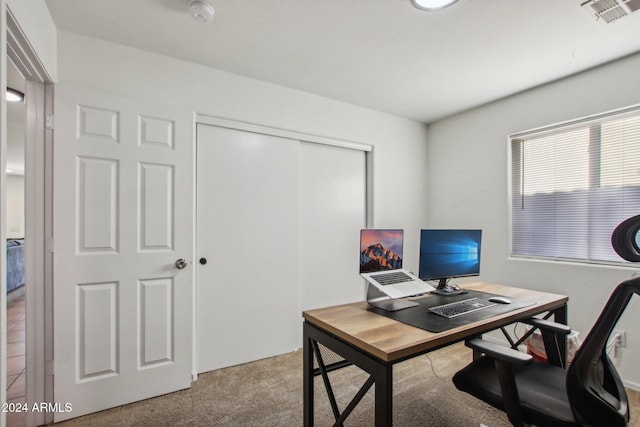 view of carpeted office space