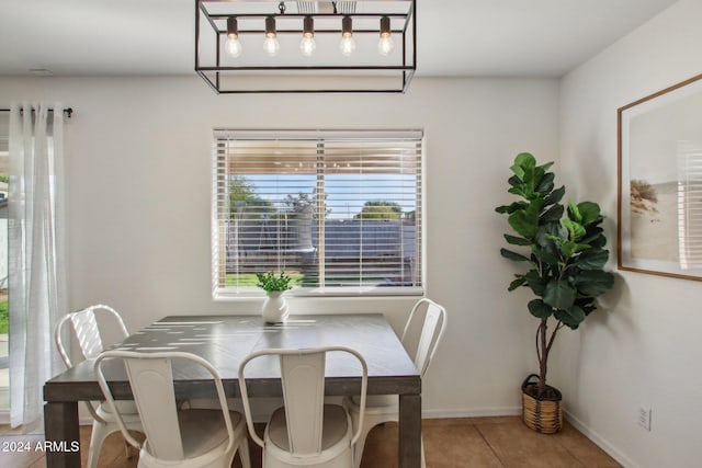 dining room featuring light tile patterned flooring