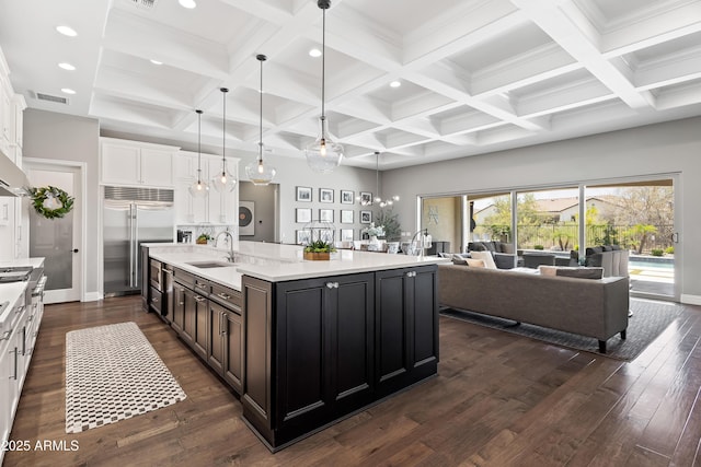 5415 E Chaparosa Way, Cave Creek, AZ 85331 - kitchen with a sink, stainless steel built in fridge, white cabinets, light countertops, and open floor plan