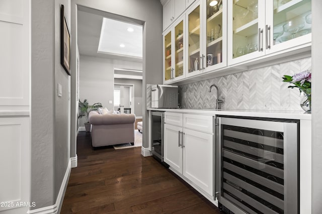 5415 E Chaparosa Way, Cave Creek, AZ 85331 - indoor wet bar featuring wine cooler, backsplash, dark wood finished floors, recessed lighting, and baseboards