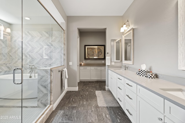 5415 E Chaparosa Way, Cave Creek, AZ 85331 - full bathroom featuring double vanity, a freestanding bath, wood finished floors, and an enclosed shower