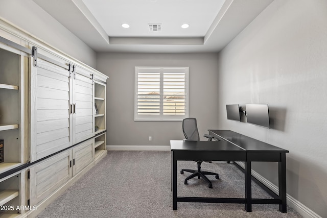 5415 E Chaparosa Way, Cave Creek, AZ 85331 - carpeted office space with a raised ceiling, baseboards, and a barn door