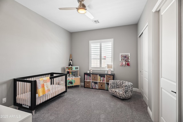 5415 E Chaparosa Way, Cave Creek, AZ 85331 - carpeted bedroom featuring a closet, baseboards, a ceiling fan, and a crib