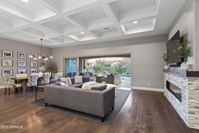 5415 E Chaparosa Way, Cave Creek, AZ 85331 - living area featuring dark wood-style floors, beamed ceiling, baseboards, a fireplace, and coffered ceiling