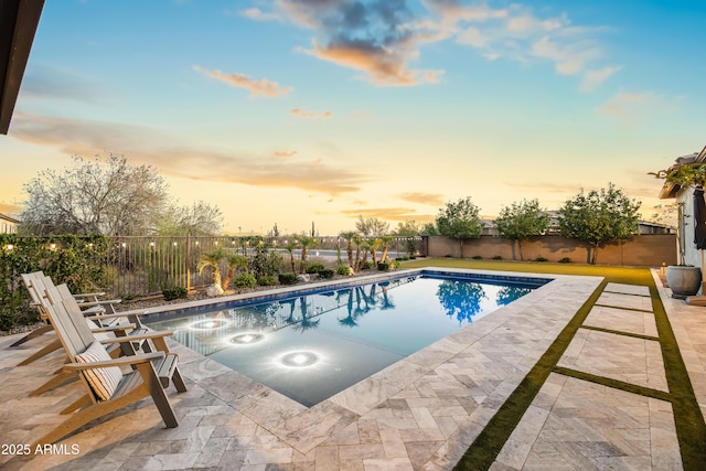5415 E Chaparosa Way, Cave Creek, AZ 85331 - pool at dusk featuring a fenced backyard and a patio