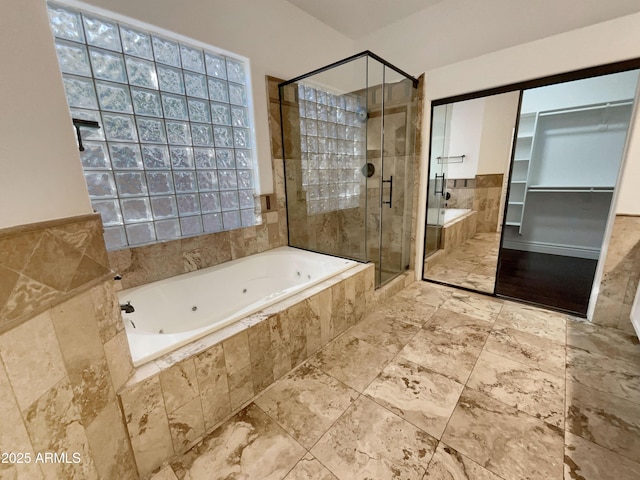 bathroom featuring plus walk in shower