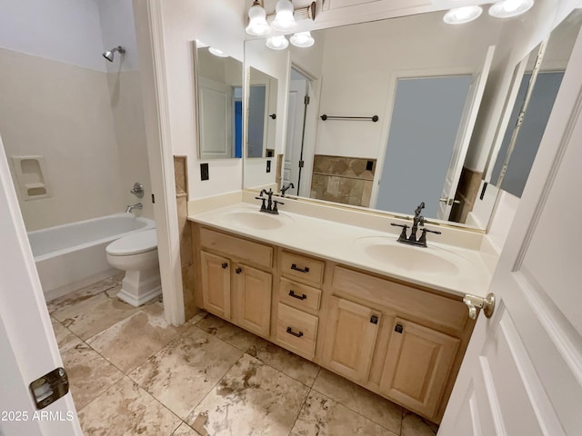 full bathroom featuring shower / tub combination, vanity, and toilet