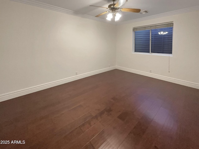 unfurnished room featuring crown molding, dark hardwood / wood-style floors, and ceiling fan