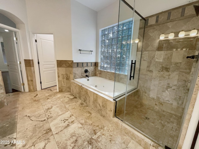 bathroom with independent shower and bath