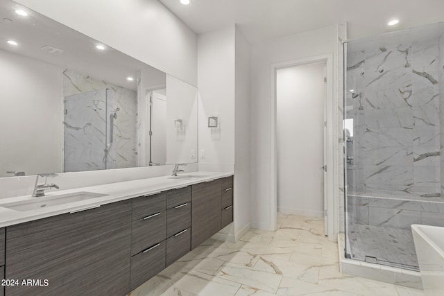 bathroom with vanity and separate shower and tub