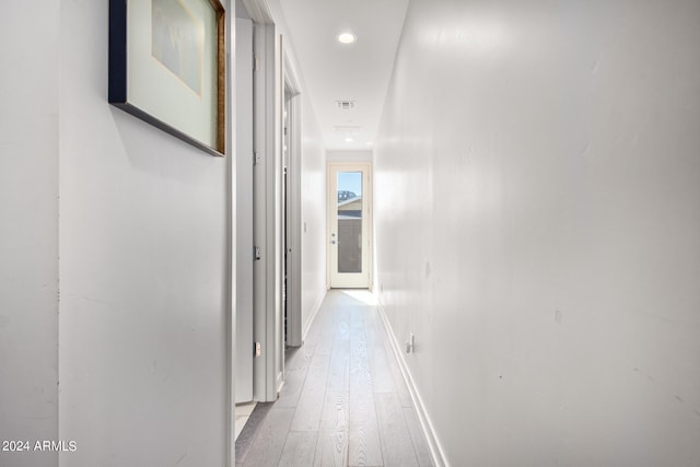 corridor featuring light wood-type flooring