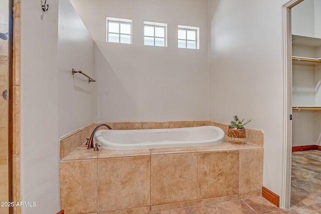 1925 W Tanya Trl, Phoenix, AZ 85086 - bathroom with a garden tub and a spacious closet
