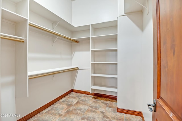 1925 W Tanya Trl, Phoenix, AZ 85086 - walk in closet with stone finish flooring