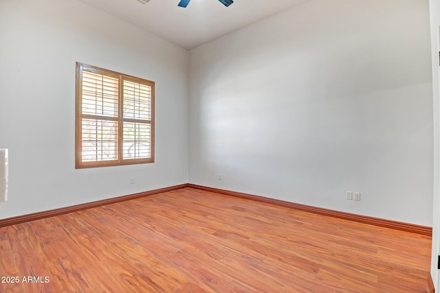 1925 W Tanya Trl, Phoenix, AZ 85086 - spare room with light wood-style flooring and a ceiling fan