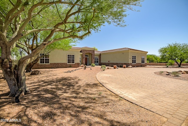 1925 W Tanya Trl, Phoenix, AZ 85086 - mediterranean / spanish house with stucco siding and curved driveway